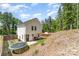 Large fenced backyard with a patio and trampoline, ideal for outdoor enjoyment at 658 Morgan Rd, Albemarle, NC 28001