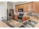 Kitchen features stainless steel appliances and wooden cabinets, and countertops at 6912 Park Place Dr, Charlotte, NC 28262