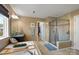 Bright bathroom with a standalone shower, large tub, and granite countertops at 7216 Old Valley Way, Harrisburg, NC 28075