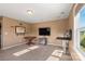 Neutral bonus room with carpet, a mounted TV and window with natural light at 7216 Old Valley Way, Harrisburg, NC 28075