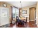 Cozy breakfast nook with hardwood floors, natural light, and views to the exterior at 7216 Old Valley Way, Harrisburg, NC 28075