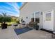 A comfortable patio with outdoor seating, and grill, perfect for entertaining at 7216 Old Valley Way, Harrisburg, NC 28075