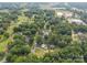 Panoramic aerial view of a lush, residential area surrounded by mature trees and manicured lawns at 804 Allen Dr, Marshville, NC 28103