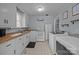 Compact kitchen with ample counter space, classic white cabinetry, and modern appliances at 804 Allen Dr, Marshville, NC 28103