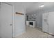 Functional laundry room with washer, dryer, and ample storage space and shelving at 804 Allen Dr, Marshville, NC 28103