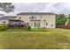 Spacious backyard features a deck, a gazebo, and a basketball hoop for outdoor fun at 8709 Barrelli Ct, Charlotte, NC 28277