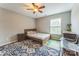 Comfortable bedroom featuring a bed, dresser, and bright area rug at 8709 Barrelli Ct, Charlotte, NC 28277