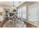 Cozy breakfast nook bathed in natural light with a round table and chairs at 8709 Barrelli Ct, Charlotte, NC 28277