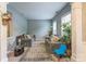 Cozy living room featuring comfortable sofas, a decorative rug, and ample natural light from the windows at 8709 Barrelli Ct, Charlotte, NC 28277