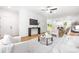 Open-concept living space with hardwood floors, modern lighting, and seamless flow to dining at 8717 Lawyers Rd, Charlotte, NC 28227