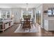 The dining room features hardwood floors, natural light, and views of the backyard at 1005 Cheviot Ct, Waxhaw, NC 28173