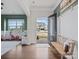 Warm entryway features hardwood floors, a bench, and a view of the home's exterior at 1005 Cheviot Ct, Waxhaw, NC 28173