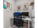 Modern office space with white desk, ergonomic chair, and decor at 1005 Cheviot Ct, Waxhaw, NC 28173