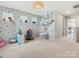 Vibrant playroom area with wall decor and toys at 1005 Cheviot Ct, Waxhaw, NC 28173