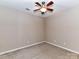 Bedroom features neutral walls, carpet, and ceiling fan, ready to be personalized and enjoyed at 10727 Ryan Courtney Sq, Mint Hill, NC 28227