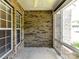 The outdoor patio features brick walls, large windows and plenty of natural light at 10727 Ryan Courtney Sq, Mint Hill, NC 28227