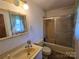 Bathroom featuring a shower-tub combo and vanity sink at 1074 25Th Ne St, Hickory, NC 28601