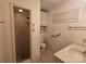 Bathroom featuring a walk-in shower, a vanity, and built-in shelving at 1074 25Th Ne St, Hickory, NC 28601