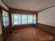 Cozy dining room featuring hardwood floors and a large window with sheer curtains at 1074 25Th Ne St, Hickory, NC 28601