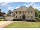 Charming brick two-story home with well-manicured lawn and attached garage at 109 Arabian Ln, Salisbury, NC 28147