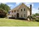 Brick two-story home featuring attached garage and manicured landscaping at 109 Arabian Ln, Salisbury, NC 28147
