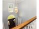 Elegant foyer featuring a decorative light fixture and grand entrance door, viewed from the upper level at 109 Arabian Ln, Salisbury, NC 28147