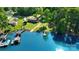 Stunning aerial view of the property on the lake with its private dock and lush surrounding landscape at 110 Lakeland Rd # 19, Mooresville, NC 28117