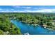 Picturesque aerial view of the lakefront community featuring lush greenery and waterfront homes with boat docks at 110 Lakeland Rd # 19, Mooresville, NC 28117