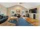 Bright living room with hardwood floors, ceiling fan and comfortable seating, perfect for relaxation at 110 Lakeland Rd # 19, Mooresville, NC 28117