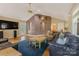 Spacious living room boasting hardwood floors, ceiling fan and ample seating options at 110 Lakeland Rd # 19, Mooresville, NC 28117