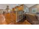 Open concept living space featuring hardwood floors, island, and a seamless flow at 110 Lakeland Rd # 19, Mooresville, NC 28117