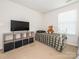 Small carpeted bedroom with a bed and television at 12304 Lookout Point Dr, Charlotte, NC 28269