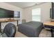Bedroom featuring multiple monitors on a desk, offering an efficient workspace at 12304 Lookout Point Dr, Charlotte, NC 28269