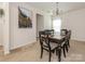 Elegant dining room with a chandelier and traditional furniture set at 12304 Lookout Point Dr, Charlotte, NC 28269