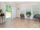 Bright sunroom with a sliding door that leads to the backyard at 12304 Lookout Point Dr, Charlotte, NC 28269