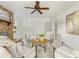 Bright and inviting living room with exposed brick fireplace and many windows at 1325 Rock Point Rd, Charlotte, NC 28270