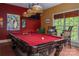 Game room featuring a pool table with unique lighting and views of the landscape at 135 Sumter Dr, Mooresville, NC 28117