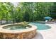 Beautiful pool and jacuzzi with a patio at 135 Sumter Dr, Mooresville, NC 28117