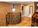 Ornate staircase with decorative wrought iron railings and wood steps, leading to the second level of the home at 135 Sumter Dr, Mooresville, NC 28117