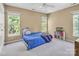 Bright bedroom with natural light, plush carpet and a twin bed at 15000 Strathmoor Dr, Charlotte, NC 28277