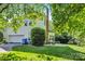 Well-maintained home exterior with a two-car garage and beautiful lawn at 15000 Strathmoor Dr, Charlotte, NC 28277