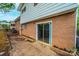 Brick house with an open backyard and a sliding glass door at 1521 19Th Sw St, Hickory, NC 28602