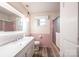 Bathroom with modern fixtures, tile accents, and a bathtub at 1521 19Th Sw St, Hickory, NC 28602