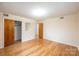 Spacious bedroom with hardwood floors, closet, and ample natural light at 1521 19Th Sw St, Hickory, NC 28602