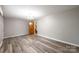 Spacious living room features new floors, neutral walls and ample natural light at 1521 19Th Sw St, Hickory, NC 28602