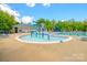 Fun splash pad with colorful water features, pool, and lounge area at 17219 Grand Central Way, Cornelius, NC 28031