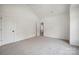New bedroom with carpet, a white door, and an open view to another room at 175 Lone Pine Rd, Statesville, NC 28625