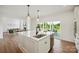 Spacious kitchen featuring an island, stainless steel appliances, and access to a porch at 175 Lone Pine Rd, Statesville, NC 28625