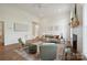 Bright living room with hardwood floors and a fireplace, furnished with modern furniture at 175 Lone Pine Rd, Statesville, NC 28625