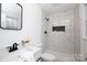 Sleek bathroom with a white vanity, modern fixtures, and a walk-in shower featuring white marble-look tiles at 1757 Ashcroft Ln, Rock Hill, SC 29732